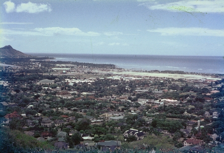 A panoramic view of Honolulu, Hawaii, and the Oahu coastline from a nearby hill top. This photo was taken by a member of t...