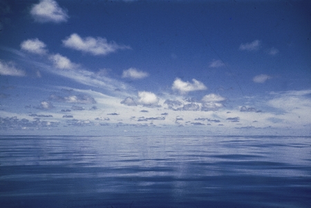 A very calm sea on a beautiful day at sea while on the Capricorn Expedition (1952-1953). This expedition mapped seamounts ...
