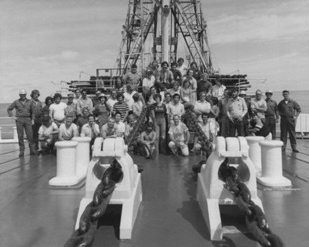 Crew of Leg 55 of the Deep Sea Drilling program on the bow of the D/V Glomar Challenger (ship). 1977.