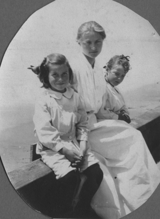 Woman and two children at the seashore