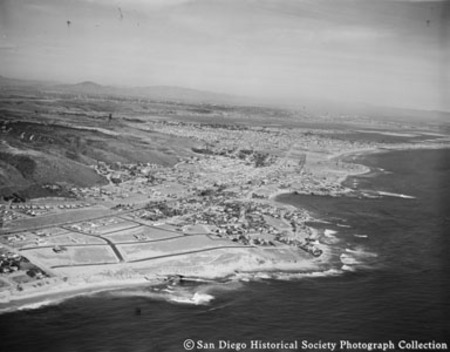 Aerial view of La Jolla coastline looking south toward Pacific Beach and Mission Bay