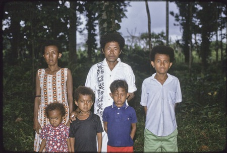 Mogiovyeka with his wife and four children, including Imala (left) and Louie Tanai (right)