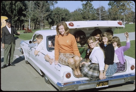 Students fill the trunk and back rear seat of a La Jolla Cab