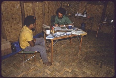 Western Highlands: anthropologist William Heaney interviewing another man
