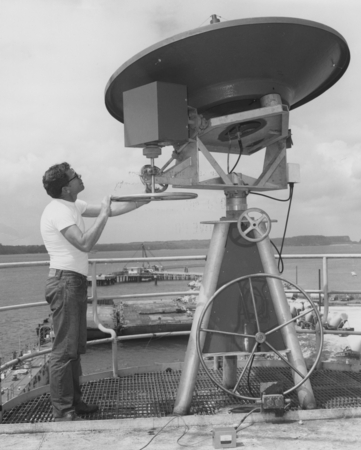 New Satellite weather Antenna-Principal Electronics Technician David Havens turns the wheel which adjusts vertical angle o...