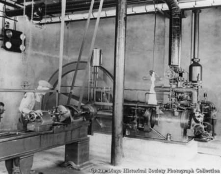 Worker and machinery at American Agar Company kelp processing facility