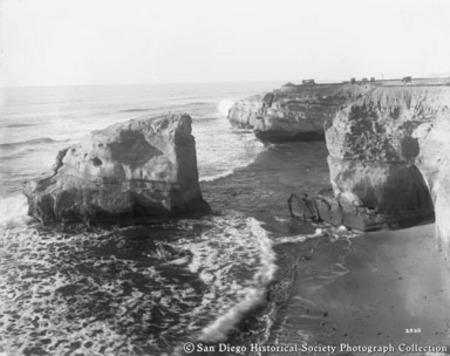 Bird&#39;s-eye view of Sunset Cliffs, rock formation, and ocean surf