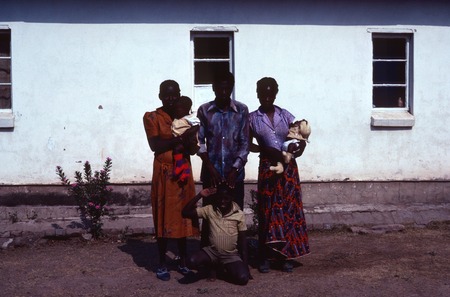 Portrait of a Fisheries employee and his family at Nsama village