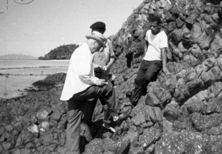 Edward Crisp Bullard and Edward L. Winterer on Vanua Lava, collecting samples of fossil limestone and uplifted pillow lava...