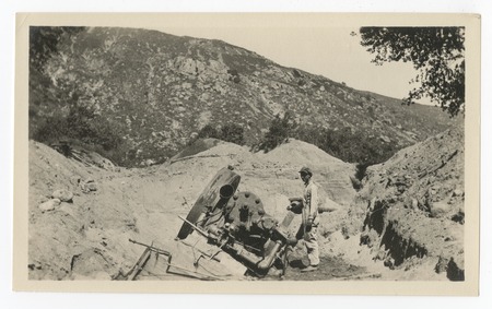 Laborer with heavy machinery for construction of the San Diego flume
