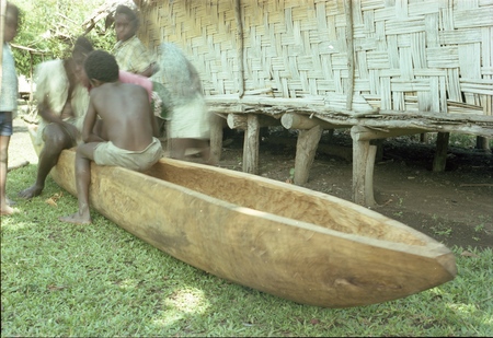 Carving of a canoe