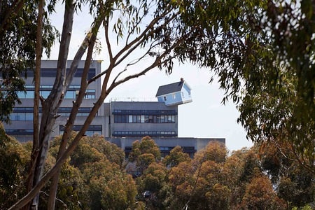 Fallen Star: distant view from the west of cantilevered house, seven stories off the ground