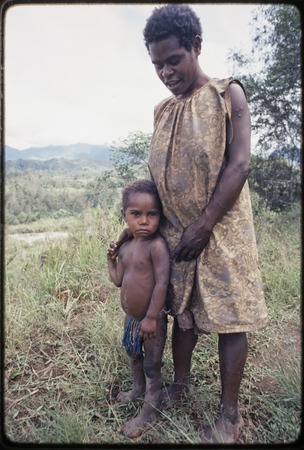 Western Highlands: woman and young child, child wears a string apron-style skirt