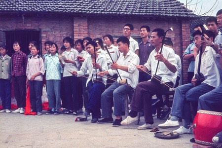 Young People Performing for Foreign Visitors