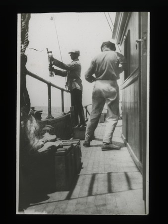 George Francis McEwen reading reversed thermometer aboard R/V Scripps