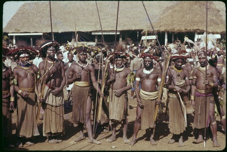 Mount Hagen show: Kandep men in traditional finery carry spears and arrows