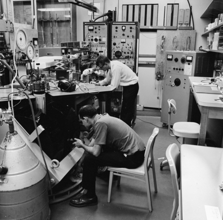 Sheldon Schultz (seated) and unidentified man in Physics Laboratory, 1221 Mayer Hall, UC San Diego