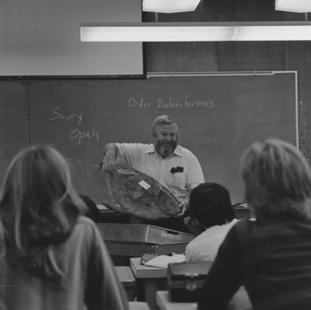 Richard H. Rosenblatt teaching an ichthyology class and holding an opah specimen, UC San Diego