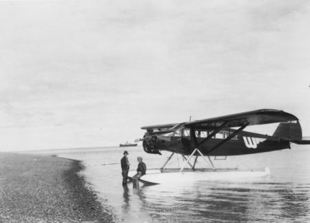 Seaplane on shore at Snag Point, Alaska