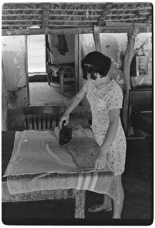 Ironing clothes at Rancho La Soledad