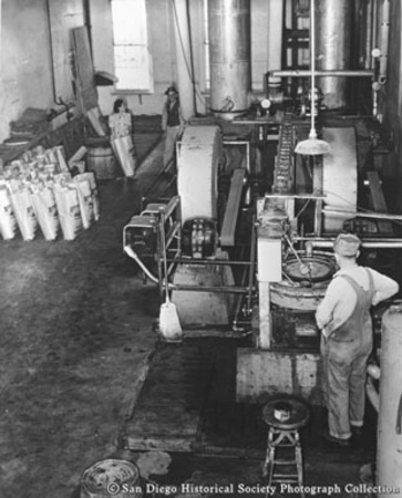 Interior of American Agar Company facility showing workers and kelp dryers