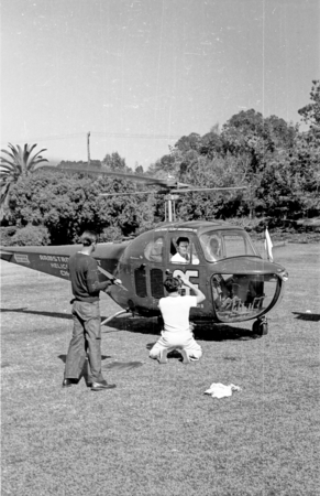 Actor Errol Flynn shown here arriving by helicopter at Scripps Institution of Oceanography. 1948.