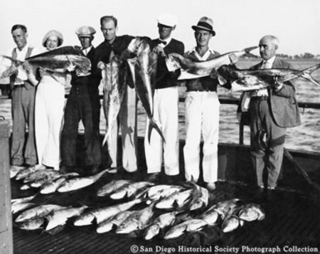 Sportfishers posing with catch of fish