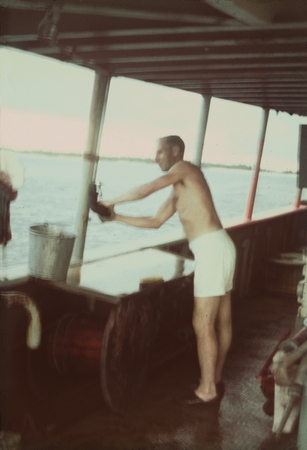 The Captain of the research vessel Horizon shown here was doing his own laundry during the MidPac Expedition (1950). 1950.