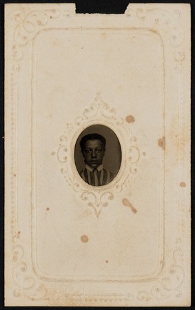 [Gem tintype of an African American girl in striped dress]