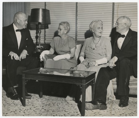Ed and Mary Fletcher with unidentified couple at formal event