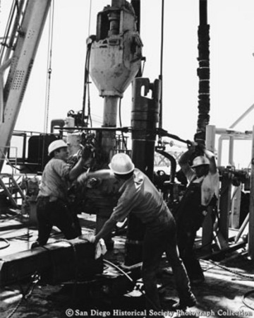 Deep sea drilling project. Roughnecks at work [aboard Glomar Challenger]