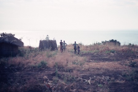 People posing near shore of Lake Mweru, Luapula District