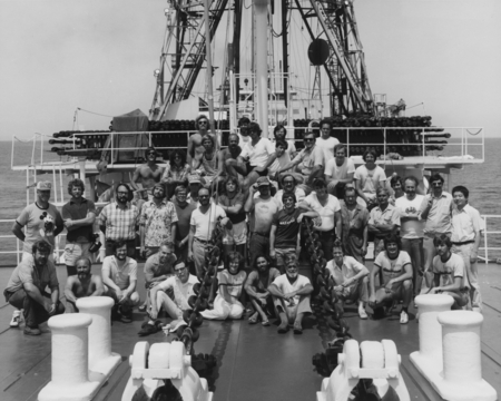 Entire crew of Leg 66 of the Deep Sea Drilling Project on the foredeck of the D/V Glomar Challenger (ship). 1979.