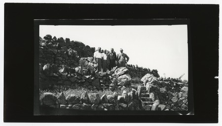 Group portrait of men standing near Mount Helix amphitheater