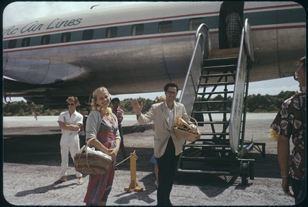 Ann and Roy Rappaport boarding a Pacific Air Lines airplane, French Polynesia