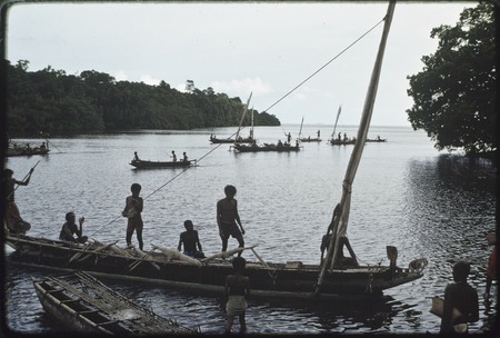 Fishing: canoes returning to inlet near Tukwaukwa, sails furled