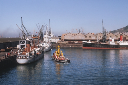 [Cape Town] Inner Harbor, ship CANTOOS, tug CECIL S. White, Victoria and Albert Waterfront