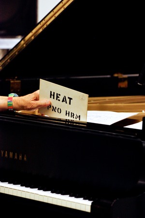 Ping: Rehearsal for 2011 UC San Diego performance: Reynolds&#39; hand holding &quot;Heat&quot; cue card