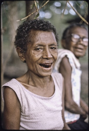 Smiling elderly women, teeth of the woman in foreground are stained from betel nut chewing