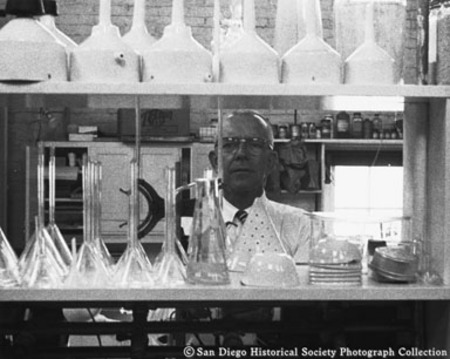 Chemist Horace Selby working in laboratory at American Agar Company