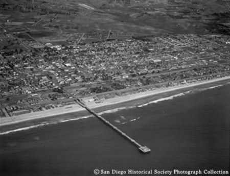 Aerial view of Oceanside coastline and pier