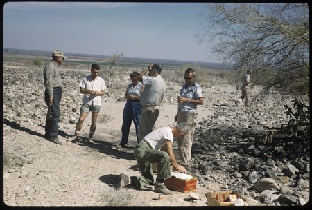 Bob Boyd, Vince Roth, Trudie Hunt, Walt Wheelock, Chestwood (kneeling), and  Tom Hunt having lunch near Colonia La Mariana | Library Digital Collections  | UC San Diego Library