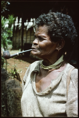 Woman with pipe.