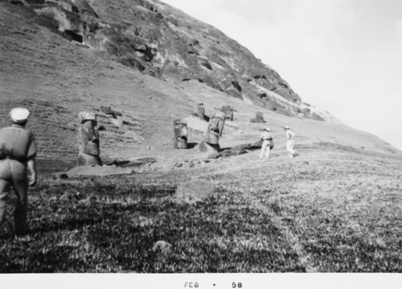 Downwind Expedition, Easter Island, R/V Spencer F. Baird. [Men viewing statues on Easter Island.]