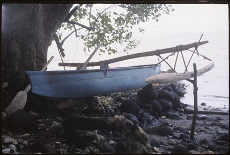 Outrigger canoe on shore, Tahiti