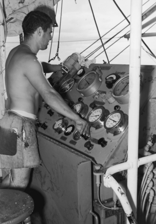William C. King at control panel of the big winch aboard R/V Spencer F. Baird
