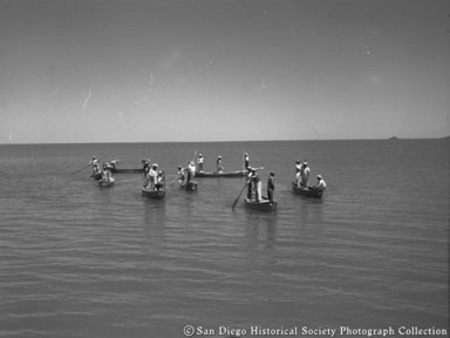 Fishermen in small rowboats off coast of Baja California