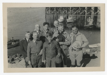 Ed Fletcher and others near a wharf