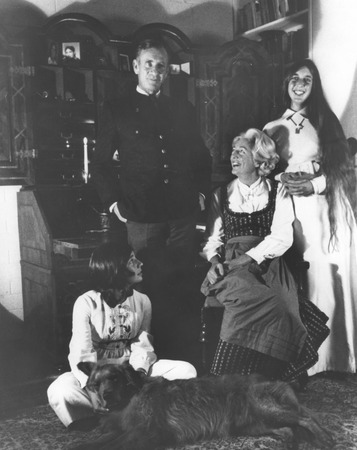 Walter Munk, Judith Munk, and daughters in traditional Austrian dress