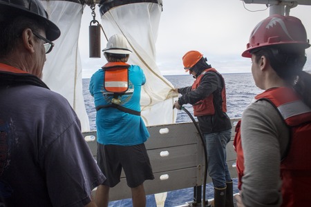 Crew and Scientists Work Together